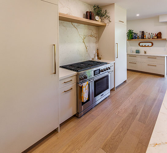 image of beautiful luxury kitchen with neolith countertops and UA Floors flooring